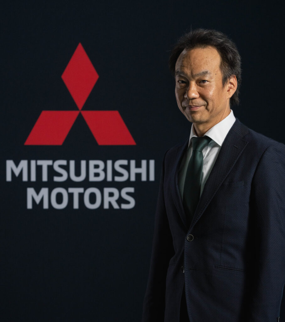A man with Logo of the Mitsubishi motors